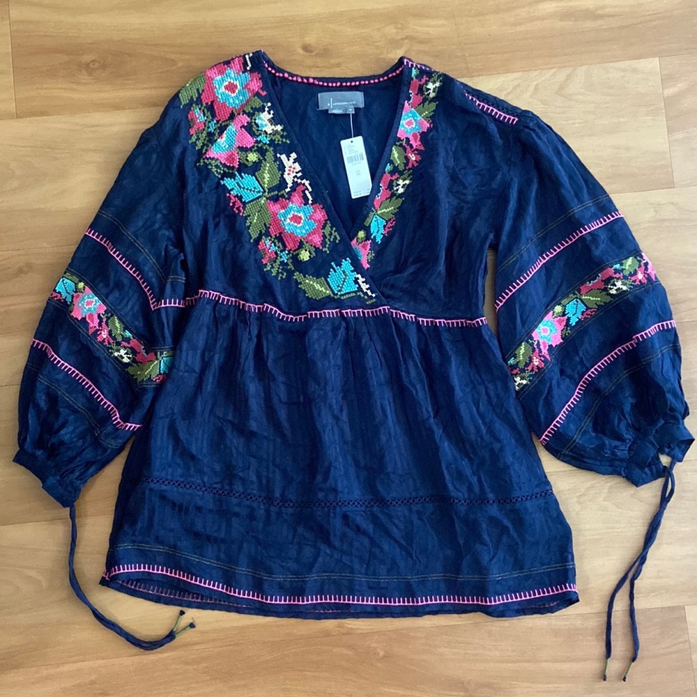 This brand new top is gorgeous - too small for me.